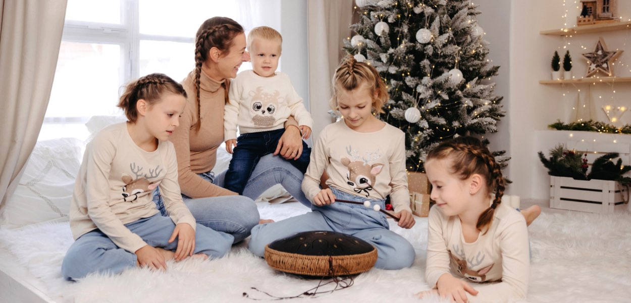 Family plays balmy drum